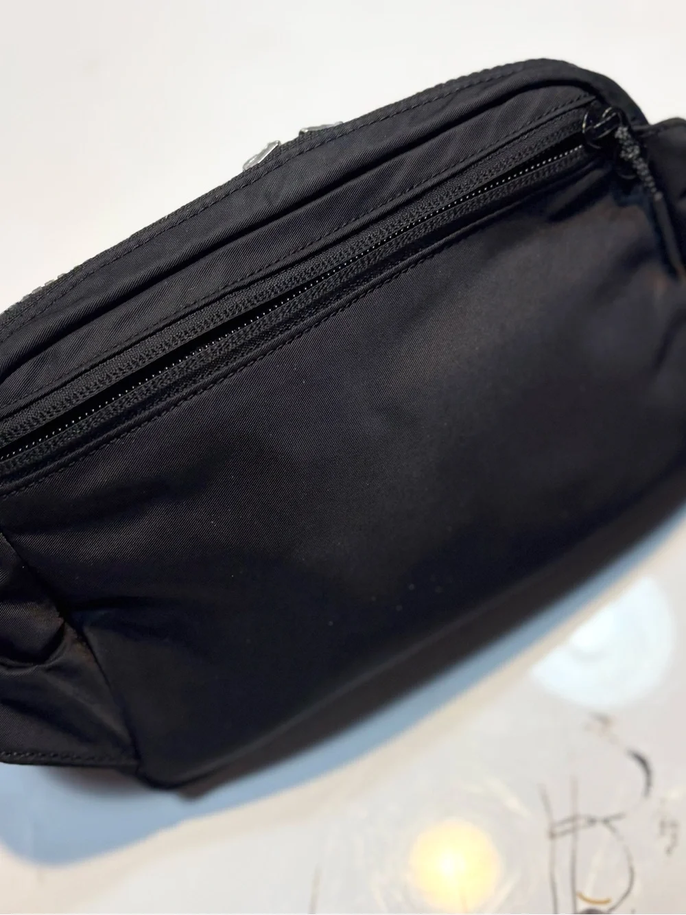 lululemon Everywhere Belt Bag 1L features a durable black nylon exterior